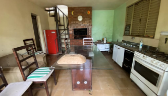 NUA PROPRIEDADE DE TERRENO URBANO COM ÁREA DE 409,40M², COM CONSTRUÇÕES EM ALVENARIA, EM SANTA ROSA/RS, localizado em Santa Rosa - RS, bairro Centro