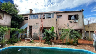 NUA PROPRIEDADE DE TERRENO URBANO COM ÁREA DE 409,40M², COM CONSTRUÇÕES EM ALVENARIA, EM SANTA ROSA/RS, localizado em Santa Rosa - RS, bairro Centro