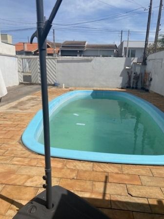 TERRENO URBANO, COM ÁREA DE 250M², COM UMA CASA EM ALVENARIA DE 102,28M², EM JACAREZINHO/PR, localizado em Jacarezinho - PR