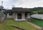 LOTE ÚNICO - DIREITOS E AÇÕES SOBRE UMA CASA RES. DE ALVENARIA, COM ÁREA APROX. DE 120,00m², EM CAXIAS DO SUL/RS